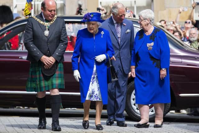 Her Majesty The Queen was greeted in Edinburgh by Lord Provost Frank Ross. Picture: Picture Duncan McGlynn/Scottish Parliament Pool Picture