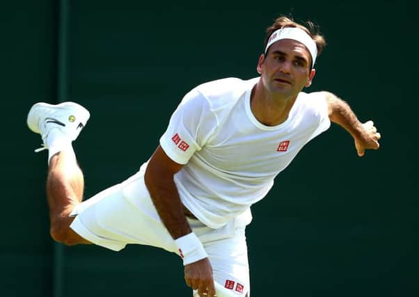 Tim Henman doesn't see any signs of veteran champion Roger Federer slowing down. Picture: Clive Brunskill/Getty Images