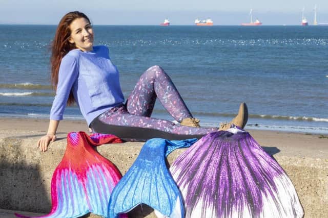 Kirsten with her mermaid tails.