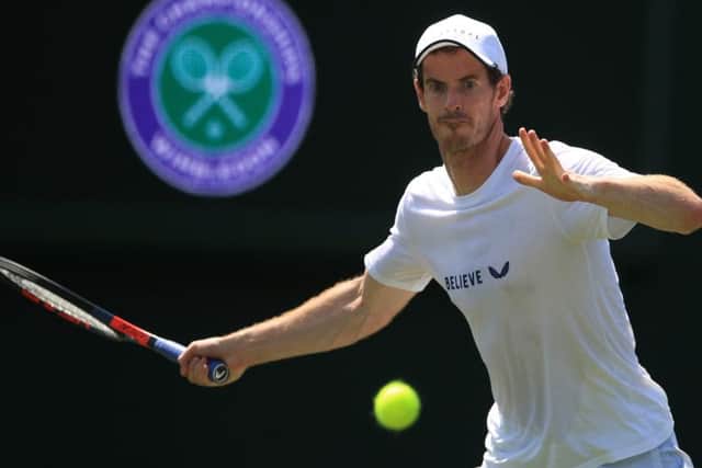 Andy Murray, on the practice courts at the All England Club, will team up with Pierre-Hugues Herbert in the mens doubles. Picture: PA.