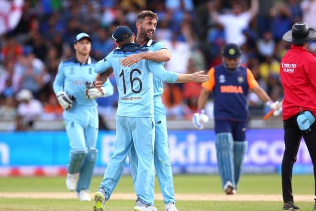 Englands Liam Plunkett (right) celebrates taking the wicket of Indias Hardik Pandya during the World Cup group stage match against India at Edgbaston on Sunday. Picture: PA.