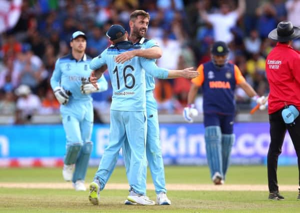 Englands Liam Plunkett (right) celebrates taking the wicket of Indias Hardik Pandya during the World Cup group stage match against India at Edgbaston on Sunday. Picture: PA.