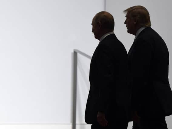 The warm relationship between US president Donald Trump and Russian president Vladimir Putin was clear at the G20 summit despite the latters claim that liberalism was dead (Picture: Susan Walsh/AP)