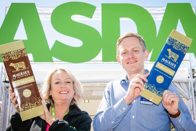 Yvonne McArthur, Asda buying assistant, and Stuart Common, Mackies sales director, celebrate the deal for Mackie's chocolate. Picture: Ian Georgeson