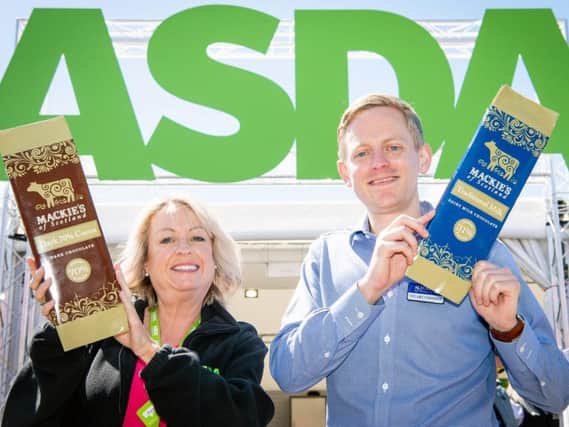Yvonne McArthur, Asda buying assistant, and Stuart Common, Mackies sales director, celebrate the deal for Mackie's chocolate. Picture: Ian Georgeson