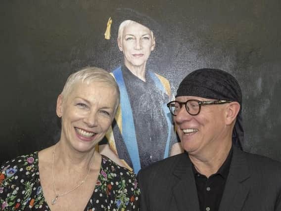 Annie Lennox with artist Gerard Burns. Picture: PA/Glasgow Caledonian University