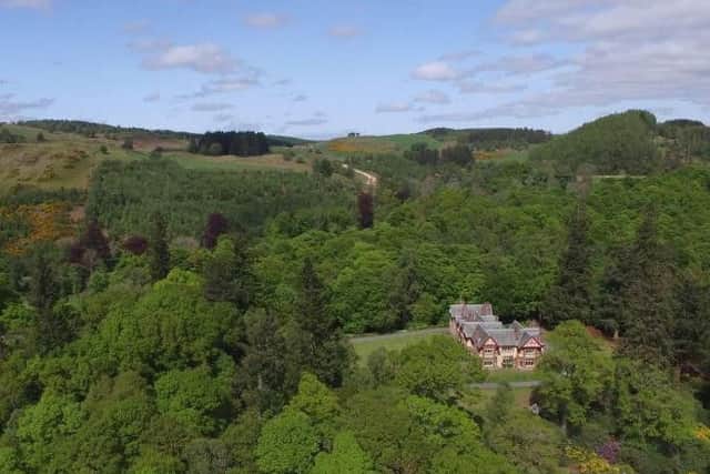 The property's approx 29 acres includes woodland.
