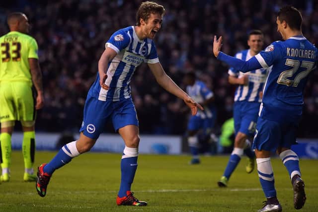 Former Manchester United forward James Wilson has signed a two-year contract with Aberdeen.