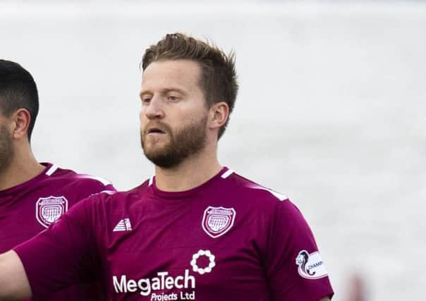 Two goals by Steven Doris helped Arbroath to defeat Hibs. Picture: SNS.