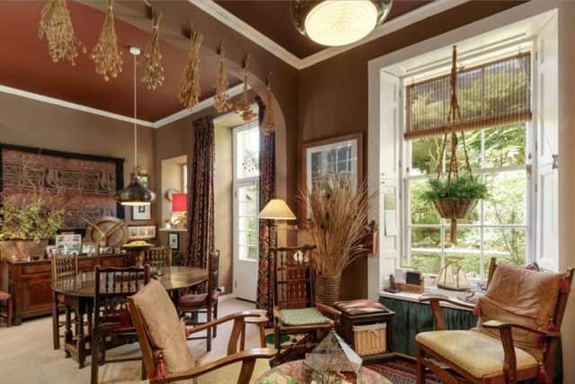 The dining/drawing room is big enough for various seating options.