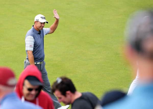 Padraig Harrington salutes the crowd after a birdie putt on the 18th on day one of the Irish Open at Lahinch. Photo: Jan Kruger/Getty
