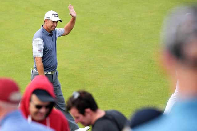 Padraig Harrington salutes the crowd after a birdie putt on the 18th on day one of the Irish Open at Lahinch. Photo: Jan Kruger/Getty