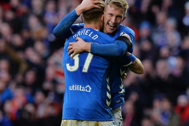 Rangers midfielder Ross McCrorie has joined Portsmouth on a season-long loan deal