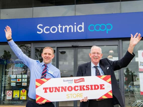 Campbell Lochie, Scotmid Tannochsides store manager, and Tunnocks managing director Sir Boyd Tunnock. Picture: Ian Georgeson