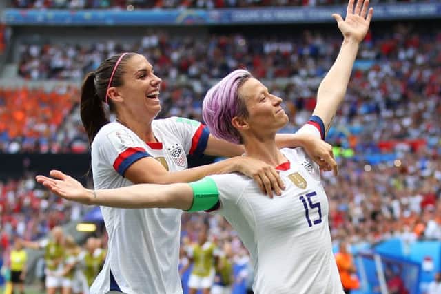 US star Megan Rapinoe performs her trademark visual ta-da after scoring the opening goal in the World Cup final against the Netherlands (Picture: Richard Heathcote/Getty Images)