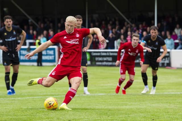 Aberdeen's Curtis Main scores a penalty to make it 1-0. Picture: Ross Parker/SNS
