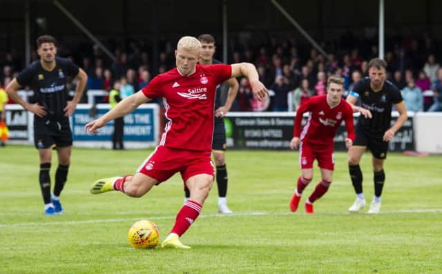 Aberdeen's Curtis Main scores a penalty to make it 1-0. Picture: Ross Parker/SNS