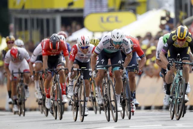 Mike Teunissen, right, outsprints Peter Sagan.Picture: Christophe Ena/AP