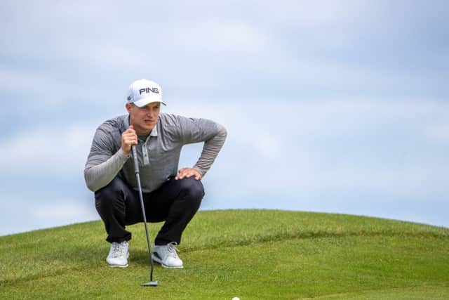 Calum Hill lines up a putt en route to equalling the Longniddry course record with a six-under-par 62 in the first round of the ASI Scottish Open qualifier. Picture: Kenny Smith