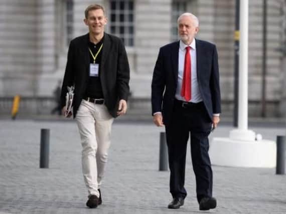 Labour's head of media, Seumas Milne (left) alongside Jeremy Corbyn