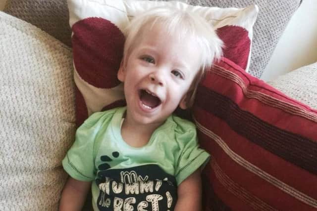 The nursery school pupil took on the challenge with his dad, Cal, 29, to raise money in memory of his best pal Ralph Rowlands, who died aged two in May 2017. Picture: SWNS