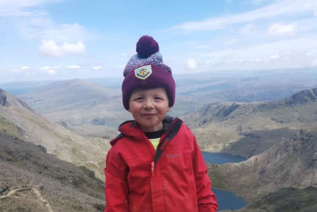 Intrepid Jaxon Krzysik, hasn't even started school but managed to summit Scafell Pike in the Lake District, Ben Nevis in Scotland and Snowdon in Wales. Picture: SWNS