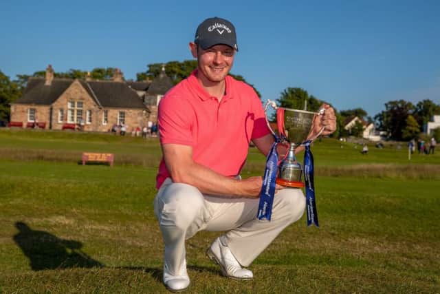 Scott Henry with his trophy for winning the Aberdeen Standard Investments Scottish Open Qualifier at Longniddry. Picture: Kenny Smith