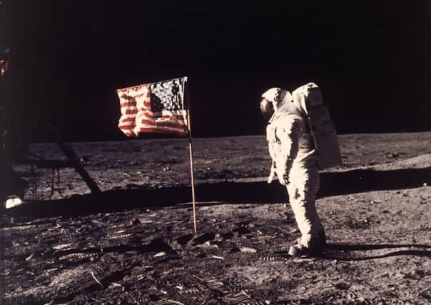 Edwin "Buzz" Aldrin poses for a photograph beside the US flag on the moon during the historic Apollo 11 mission on July 20, 1969. (Picture: Neil Armstrong/Nasa via AP)