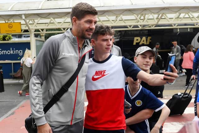 Rangers manager Steven Gerrard with a fan at Glasgow Airport. Picture: Gary Hutchison/SNS