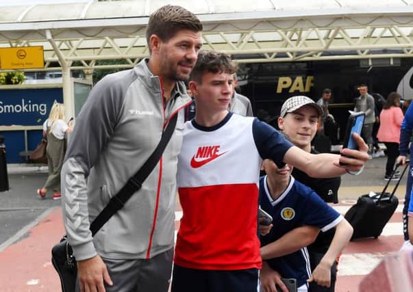 Rangers manager Steven Gerrard with a fan at Glasgow Airport. Picture: Gary Hutchison/SNS