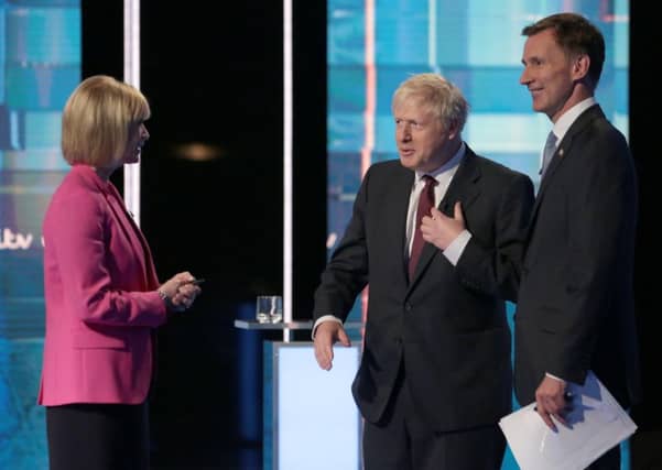 Julie Etchingham with Boris Johnson and Jeremy Hunt. (Photo by Matt Frost/ITV via Getty Images)