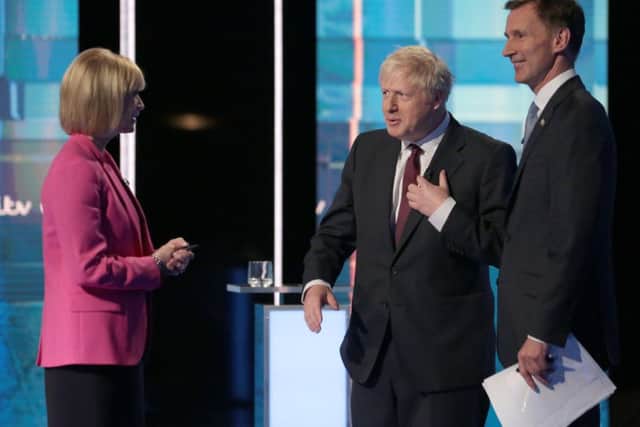 Julie Etchingham with Boris Johnson and Jeremy Hunt. (Photo by Matt Frost/ITV via Getty Images)