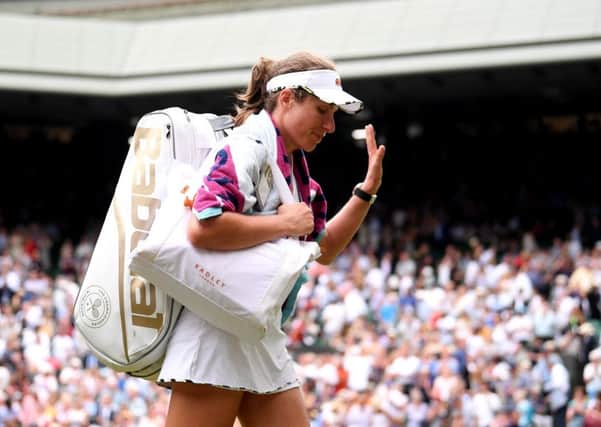 Johanna Konta  walks off the Centre Court  after losing to  Barbora Strycova. Picture: Laurence Griffiths/Getty