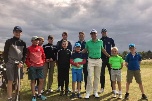 Justin Thomas meets some of the local juniors
