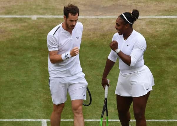 Andy Murray celebrates with Serena Williams. Picture: AFP/Getty Images