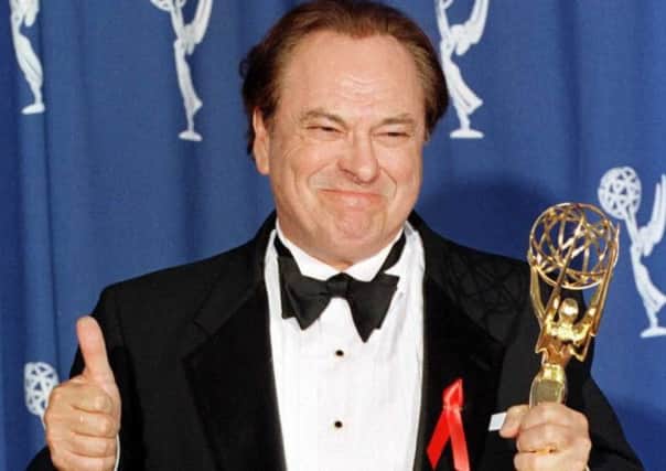 Rip Torn gives the thumbs up as he holds his Emmy Award for for his role as Arthur in the The Larry Sanders Show. Picture: AFP/Getty