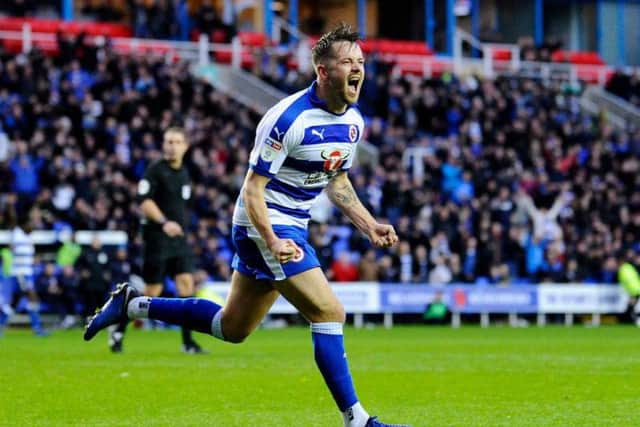 Hibs are looking to bring Reading striker Marc McNulty back to the club.