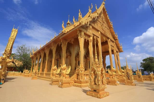 The Golden Temple landmark of Wat Pak Nam, Thailand