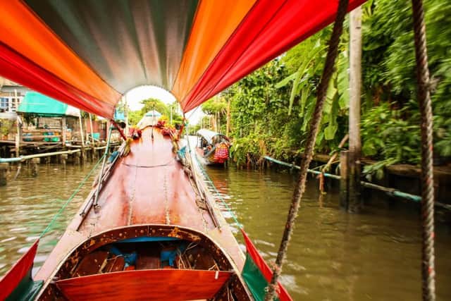 Exploring Bangkok by water on the Chao Phraya river on a longtail boat