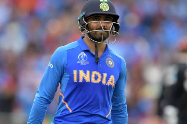 A dejected Ravindra Jadeja walks off as his 77 proved in vain for India. Picture: Dibyangshu Sarkar/AFP/Getty