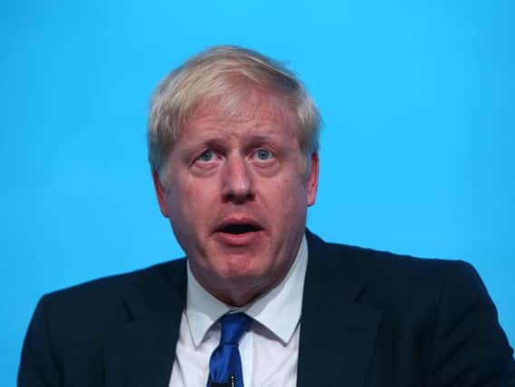 Boris Johnson has been criticised for failing to support the UK's ambassador to the US, Kim Darroch.