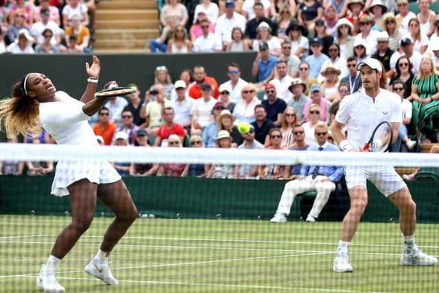 Serena Williams has to react quickly to return a volley, but she and Andy Murray lost out in three sets to Bruno Soares and Nicole Melichar on Court No 2