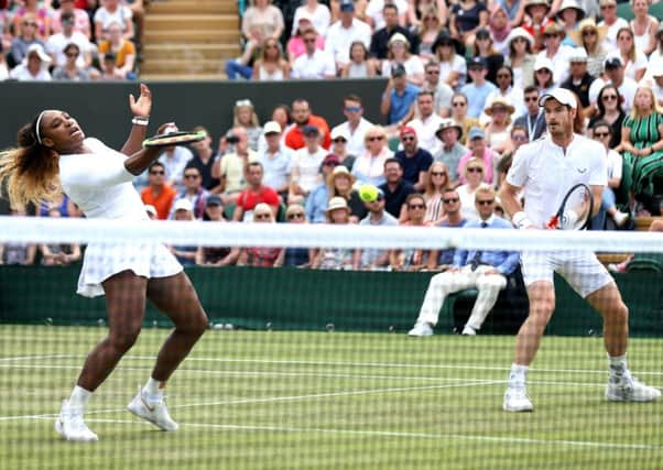 Serena Williams has to react quickly to return a volley, but she and Andy Murray lost out in three sets to Bruno Soares and  Nicole Melichar on Court No 2