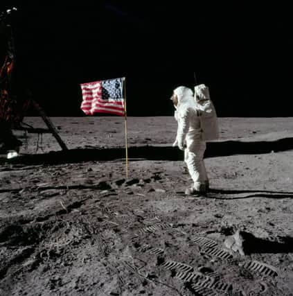 Buzz Aldrin salutes the US flag on the moon  rather than a TV studio as 12 per cent of Britons appear to believe (Picture: Neil Armstrong/Nasa via AP)