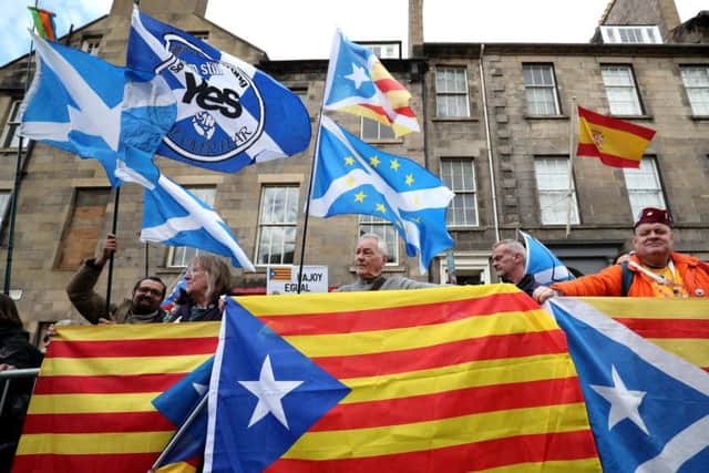 Demonstrators outside the Spanish Consulate in Edinburgh protest against the extradition to Spain of the former Catalan education minister Clara Ponsati in March 2018. Picture: PA