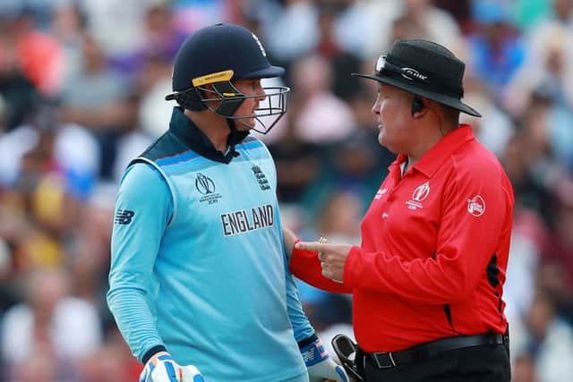 Umpire Marais Erasmus has to step in as Jason Roy protests after being given out caught behind. Picture: David Rogers/Getty