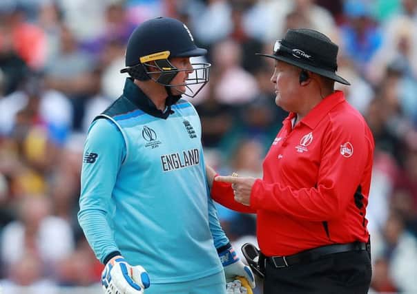 Umpire Marais Erasmus has to step in as Jason Roy protests after being given out caught behind. Picture: David Rogers/Getty