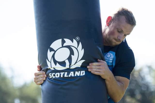 Tough tackler: Rory Hutchison's defensive qualities could bring an added factor to the Scotland midfield. Picture: SNS Group