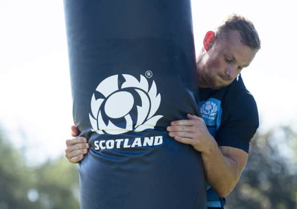 Tough tackler: Rory Hutchison's defensive qualities could bring an added factor to the Scotland midfield. Picture: SNS Group