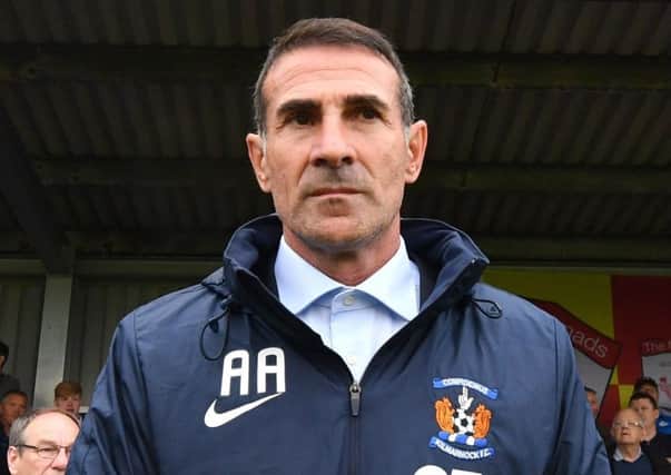 Kilmarnock manager Angelo Alessio favoured the buttoned-up shirt look with no tie. Picture: Anthony Devlin/PA Wire